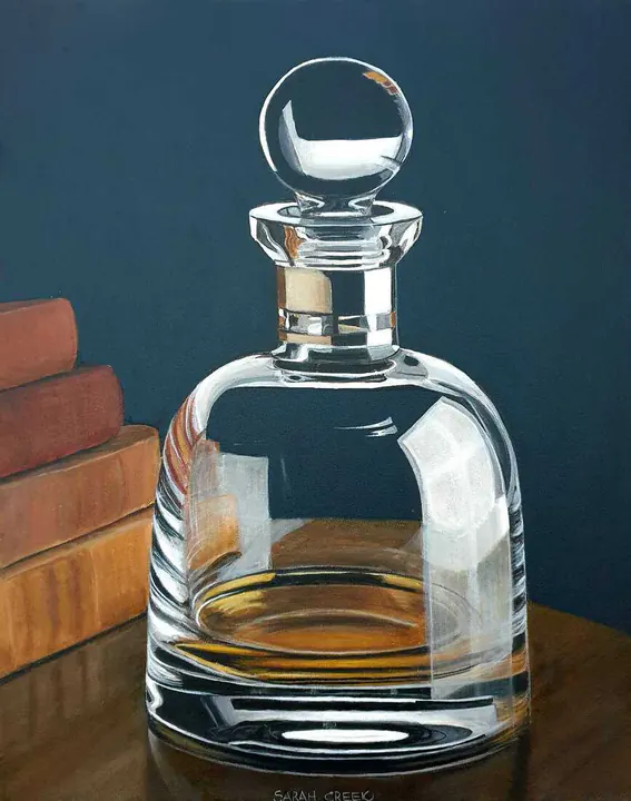 First a book and a brandy, Decanter with cognac